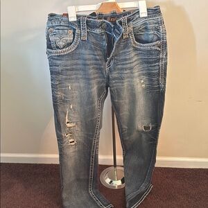 Rock Revival Faded Indigo Jeans with Distressed Details